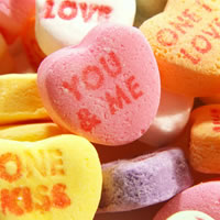 Heart shaped candy says, You and Me